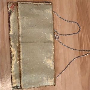 Gold sequined envelope clutch